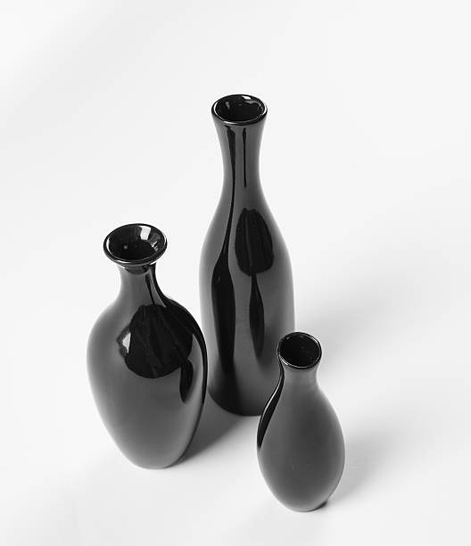 istock Set of ceramic black vases on white background. 187275266