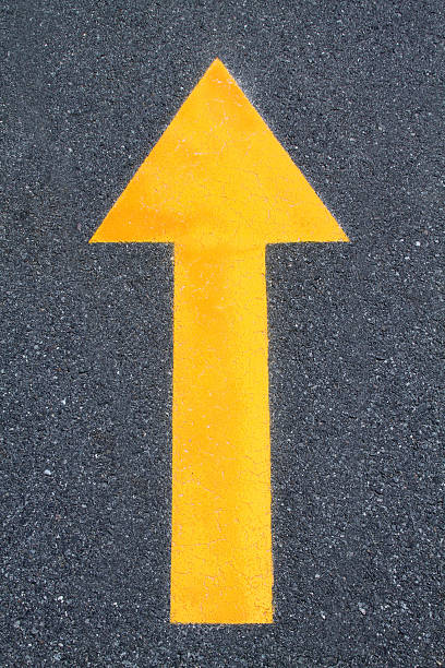 istock Street painted arrow pointing up 187275547