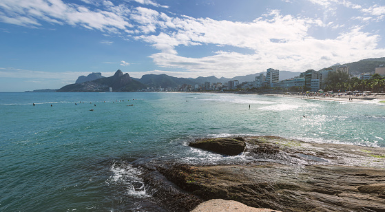 Rio de Janeiro, Brazil. Ipanema beach, Leblon beach and Dois Irmãos hill from Arpoador on a sunny day.