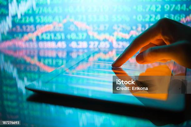 Stock Market On Digital Tablet Stock Photo - Download Image Now - Adult, Advice, Bank - Financial Building