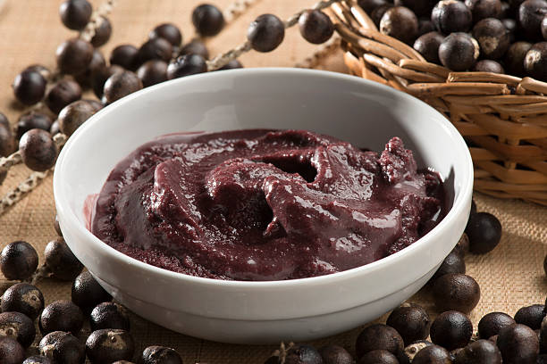 Foodstuff Acai cream bow, Brazil’s Amazon Acai berry is a superfruit that contains several substances called anthocyanins and flavonoids, and it is considered an elite superfood with anti-aging, and weight loss properties. acai stock pictures, royalty-free photos & images