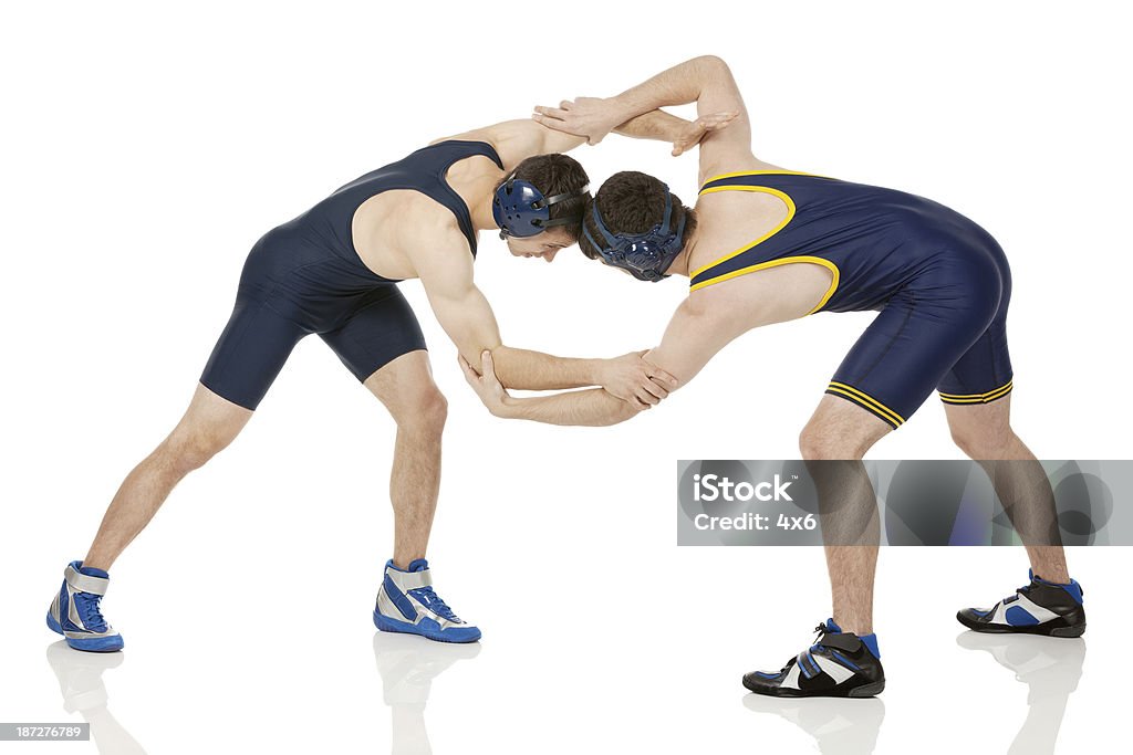 Wrestlers in action Wrestlers in actionhttp://www.twodozendesign.info/i/1.png 20-29 Years Stock Photo