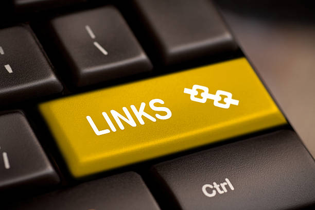 links enter key yellow links enter key and silver chain icon. click link stock pictures, royalty-free photos & images