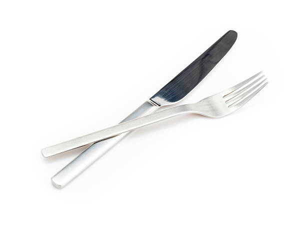 istock stainless fork and knife isolated on a white background 187280548