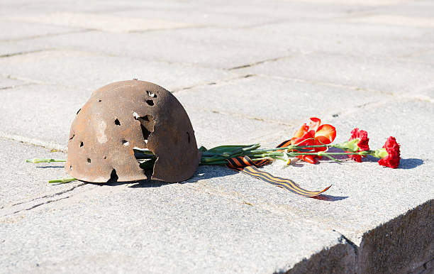 istock Old military helmet. Day of memory 187281386
