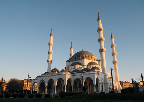 Melike Hatun Mosque with four minarets at sunset.  The mosque is preparing for the islamic holy month of Ramadan in Capital of Turkey. Ulus, Ankara Turkiye - December 20 2023
