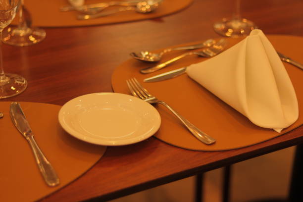 istock Table with Cutlery, Plates and Glasses 1872838057