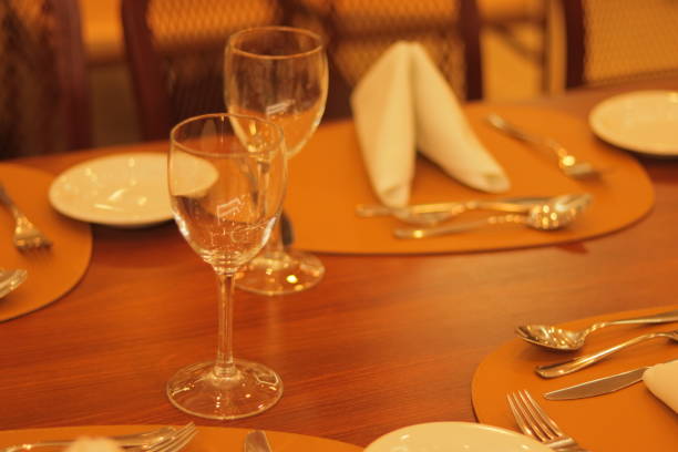 istock Table with Cutlery, Plates and Glasses 1872839086
