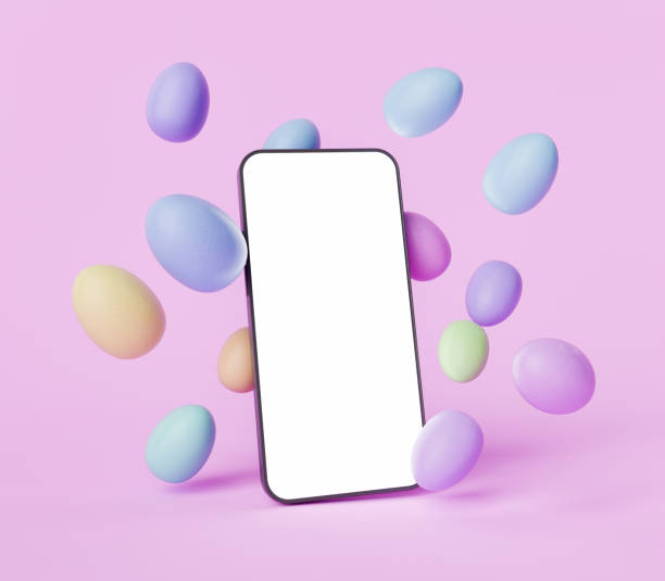 istock Smartphone with Pastel Easter Eggs Floating Around on Pink Background 1872847424