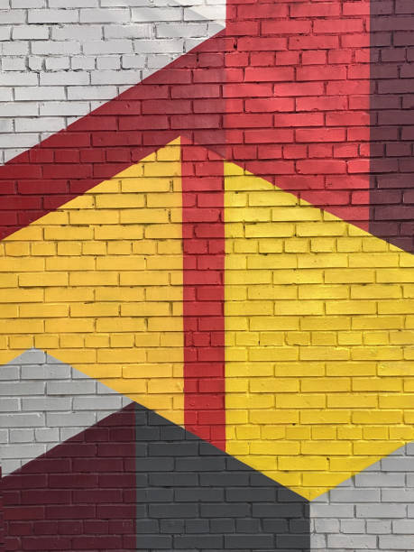 istock Bright colorful wall geometric forms painted made of brick concrete 1872868153