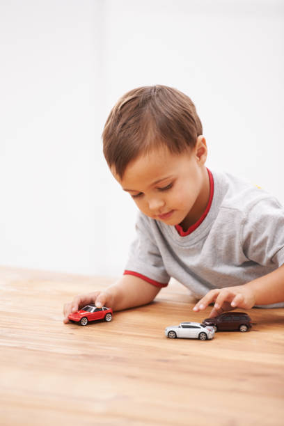 istock Boys and their toys! 187288616