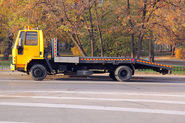 Yellow truck truck, isolated on white, with clipping path. The shadow of the lower version is not icluded in the area surround by clipping path.