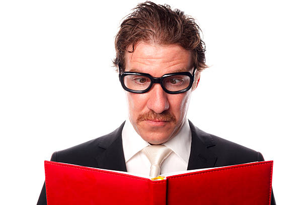 istock Young adult reading a book 187289528