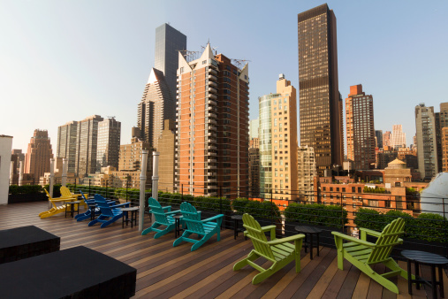 Terrace in Manhattan east side with view of midtown skyscrapers, shoot on a summer morning