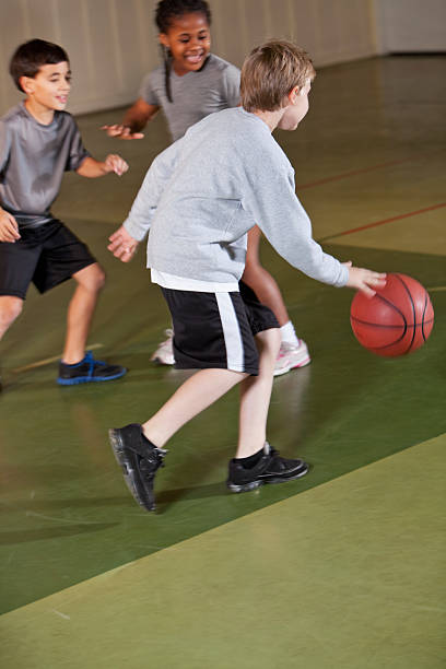 istock Children playing basketball 187289901