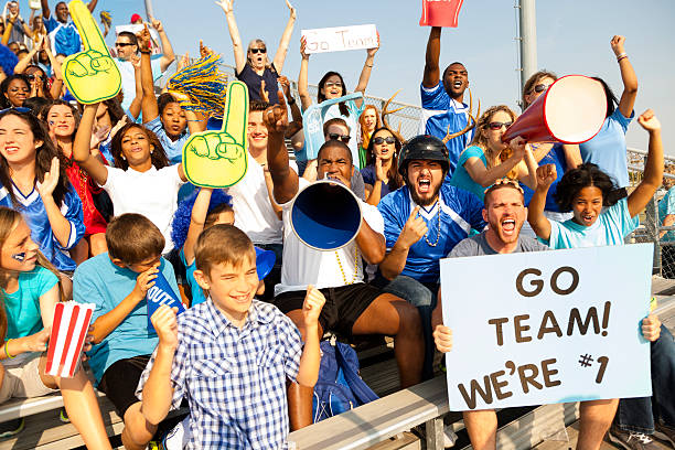 istock Sports: Fans cheer for their team during local sporting event. 187290050