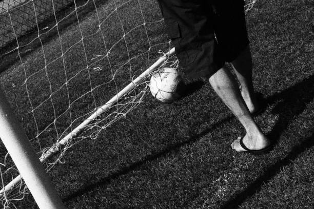istock Man Playing Football. Monochromatic Black and White Tones 1872902175