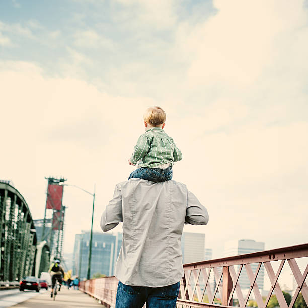 istock Man Giving his Toddler a Ride 187292398