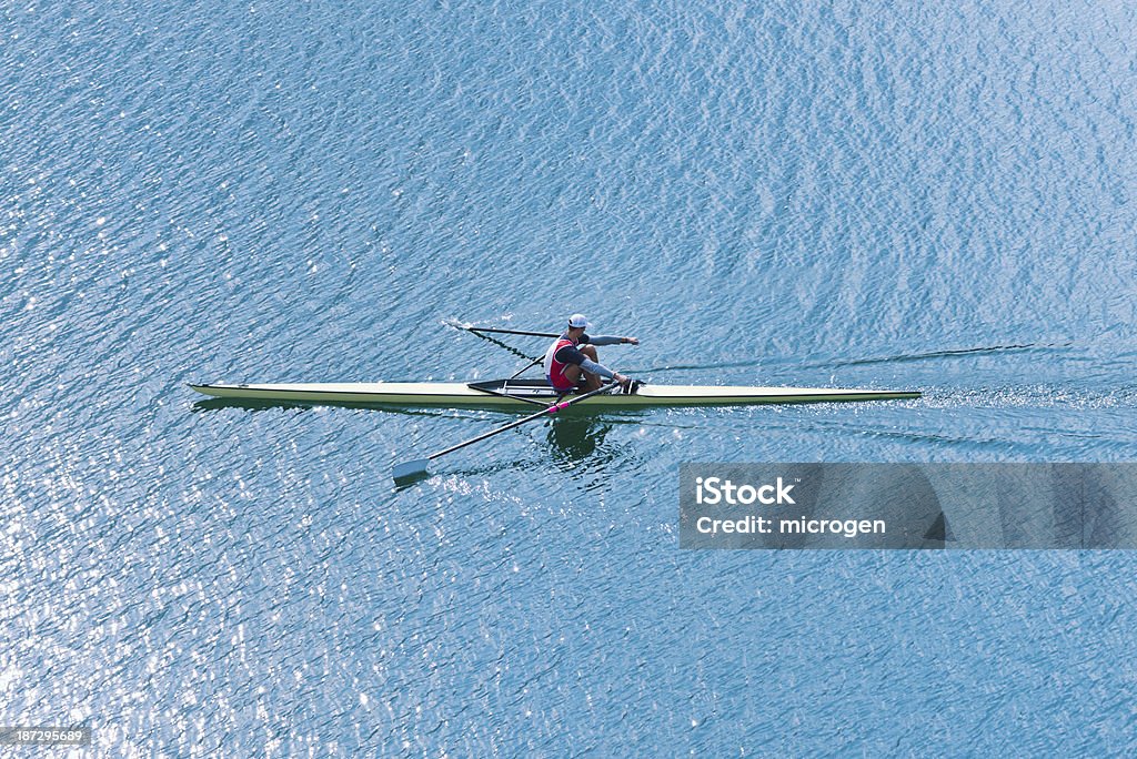 Men's single scull Male athlete rowing in single scull Single Scull Stock Photo