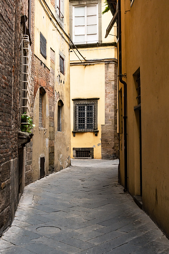 the old street of the old town of Lucca with the medieval architecture. Tuscany. Italy