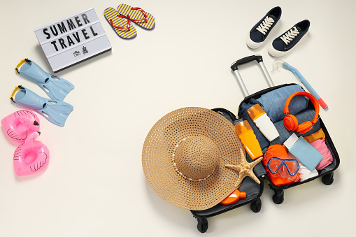 Suitcase, luggage, baggage for summer travel and vacation, top view