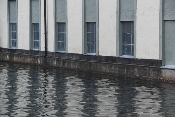 Full frame shot of a building next to water