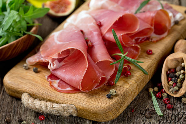istock sliced prosciutto on a wooden board 187303548