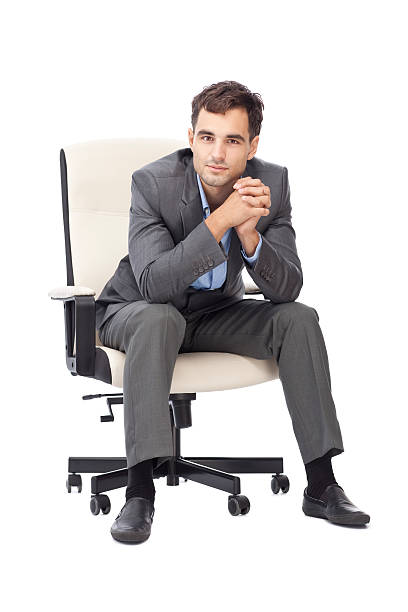 istock Relaxed business man isolated on white. 187304730