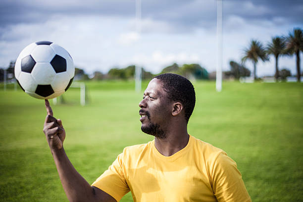 istock Football Player Spinning a Ball on his Finger 187304861