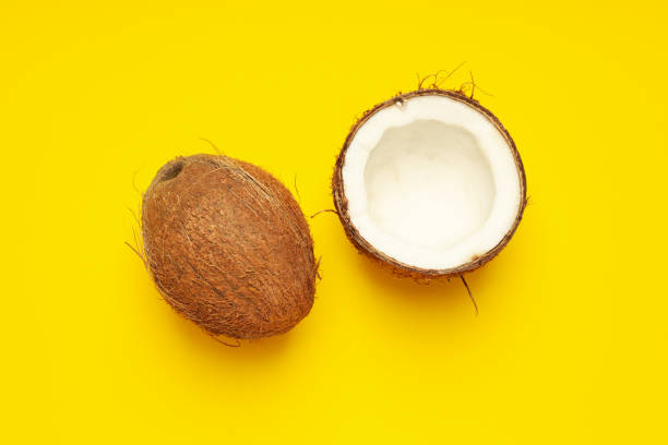 istock Composition for summer concept with coconut on yellow background 1873050940
