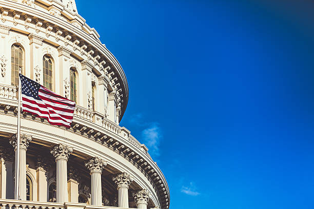 Capitol Hill Building in Washington D.C. and U.S. Flag