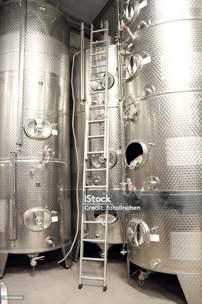 Stainless steel tanks Stainless steel tanks for fruit juice in a factory. Agriculture Stock Photo