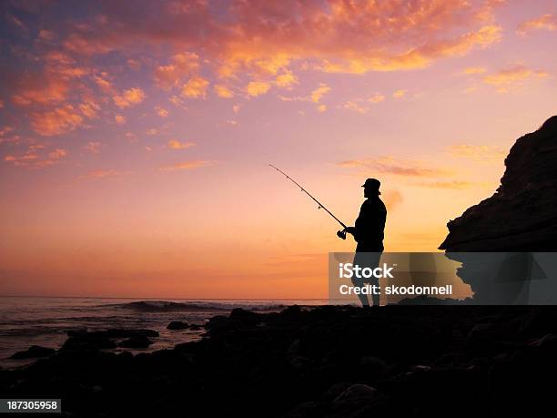 Fishing At Sunset Stock Photo - Download Image Now - Back Lit, Concepts, Dusk