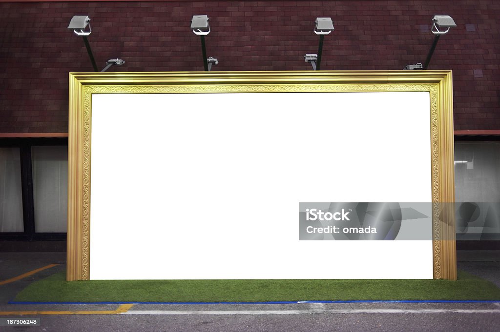 Urban billboard on the street A big frame blank in the urban scene, clipping path included. Advertisement Stock Photo