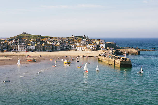 St Ives harbour and beach on the coast of Cornwall St Ives in Cornwall, England. st ives cornwall stock pictures, royalty-free photos & images