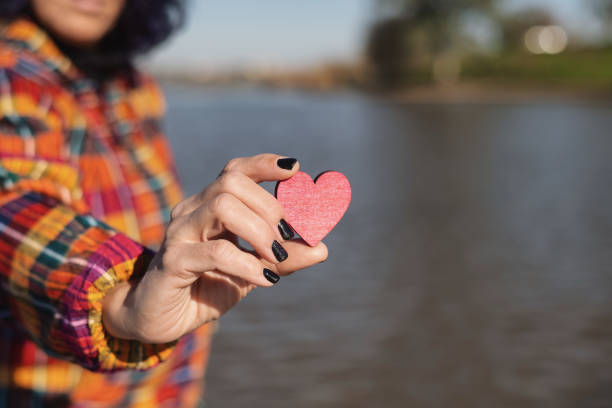 istock Unrecognizable Person Showing A Red Heart. 1873082957