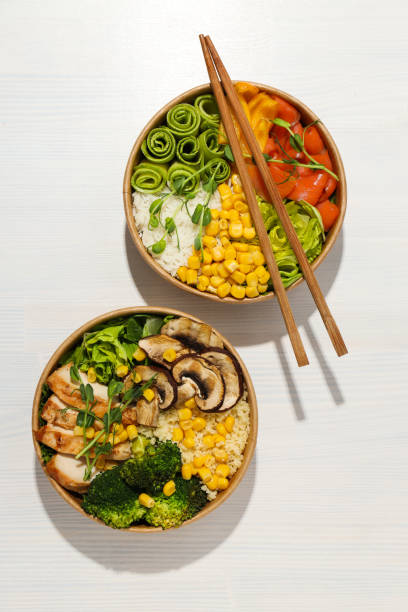 istock Bowls with tasty and nutritious food, top view 1873083492