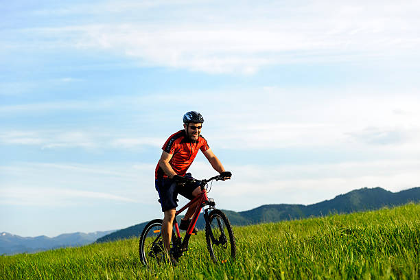 istock man riding bike 187309296