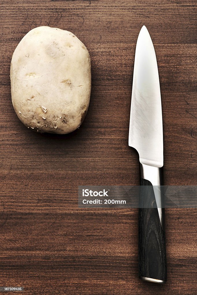 Papas y cuchilla - Foto de stock de Alimento libre de derechos