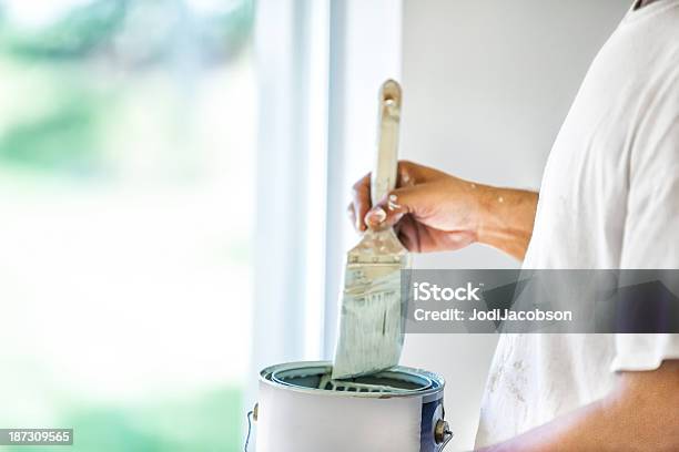 Painter Dipping His Brush In Paint Can Stock Photo - Download Image Now - House Painter, Paint Can, Painting - Activity