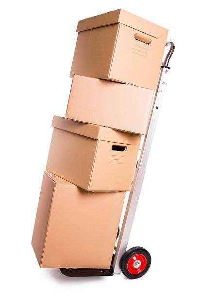 istock hand truck and carton boxes (clipping path) 187309968