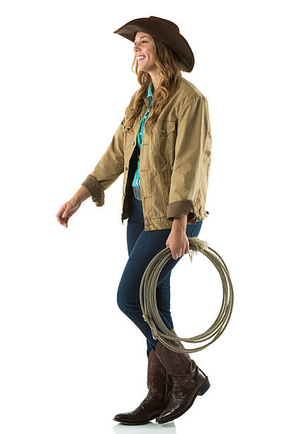 istock Happy cowgirl walking 187310877