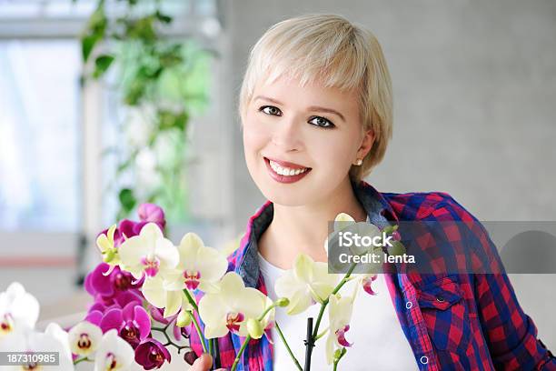 Girl With Orchids Stock Photo - Download Image Now - Adult, Adults Only, Beautiful People