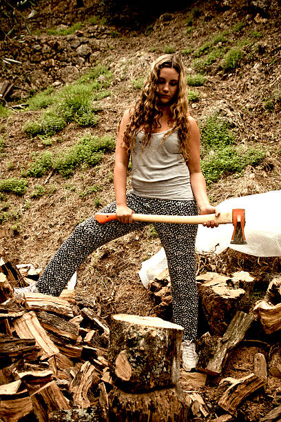 230+ Axe Cutting Wood Women Stock Photos, Pictures & Royalty-Free Images -  iStock
