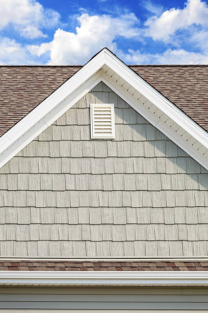 istock New Cedar style vinyl siding, soffit, asphalt roofing 187311594
