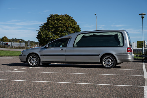 Gothenburg, Sweden - October 08 2023: Silver Volvo funeral car in a parking lot.