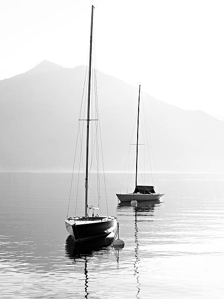 Two sail boats in early morning.