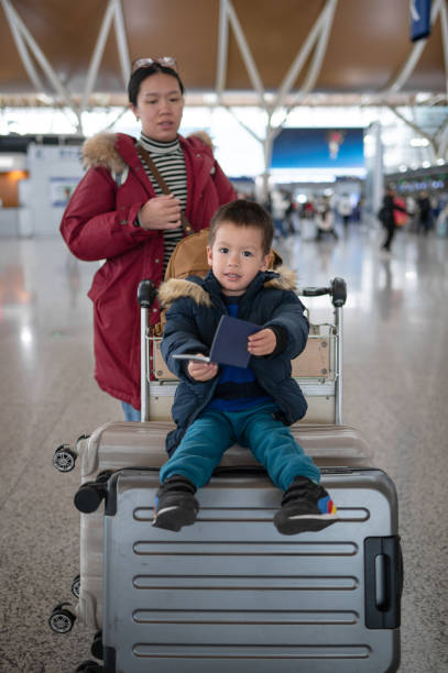 istock Adventurous beginnings: Multiracial toddler ready to travel 1873148376