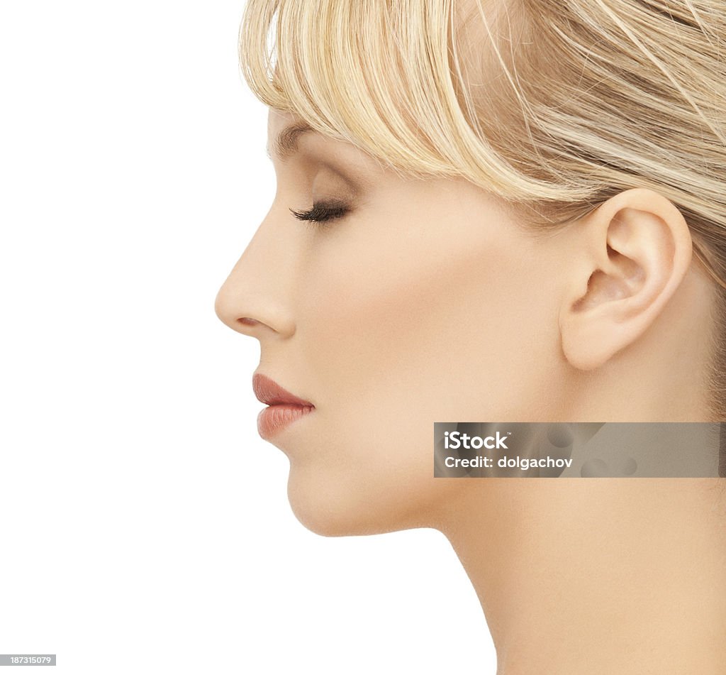 young woman close up of clean face of beautiful young woman Women Stock Photo