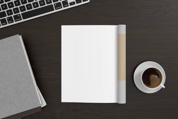 istock Magazine left-hand page mockup on black wooden workplace desk 1873154106